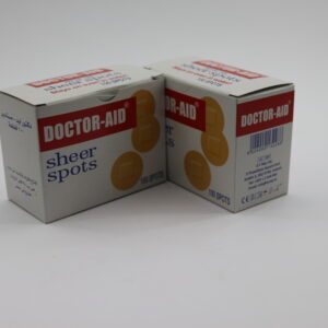 This is a box of Doctor-Aid Sheer Spots adhesive bandages. 100 round, sheer spots. لاصق طبي مدور دكتور ايد 100 قطعة